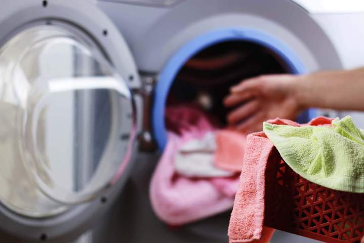 Unloading laundry from a washing machine Mitcham VIC